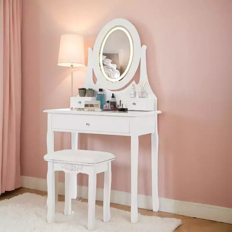 Set toeletta con ampio specchio illuminato a LED con 3 modalità, comò in legno per camera da letto con presa di corrente, cassetti, sgabello contenitore, rosa